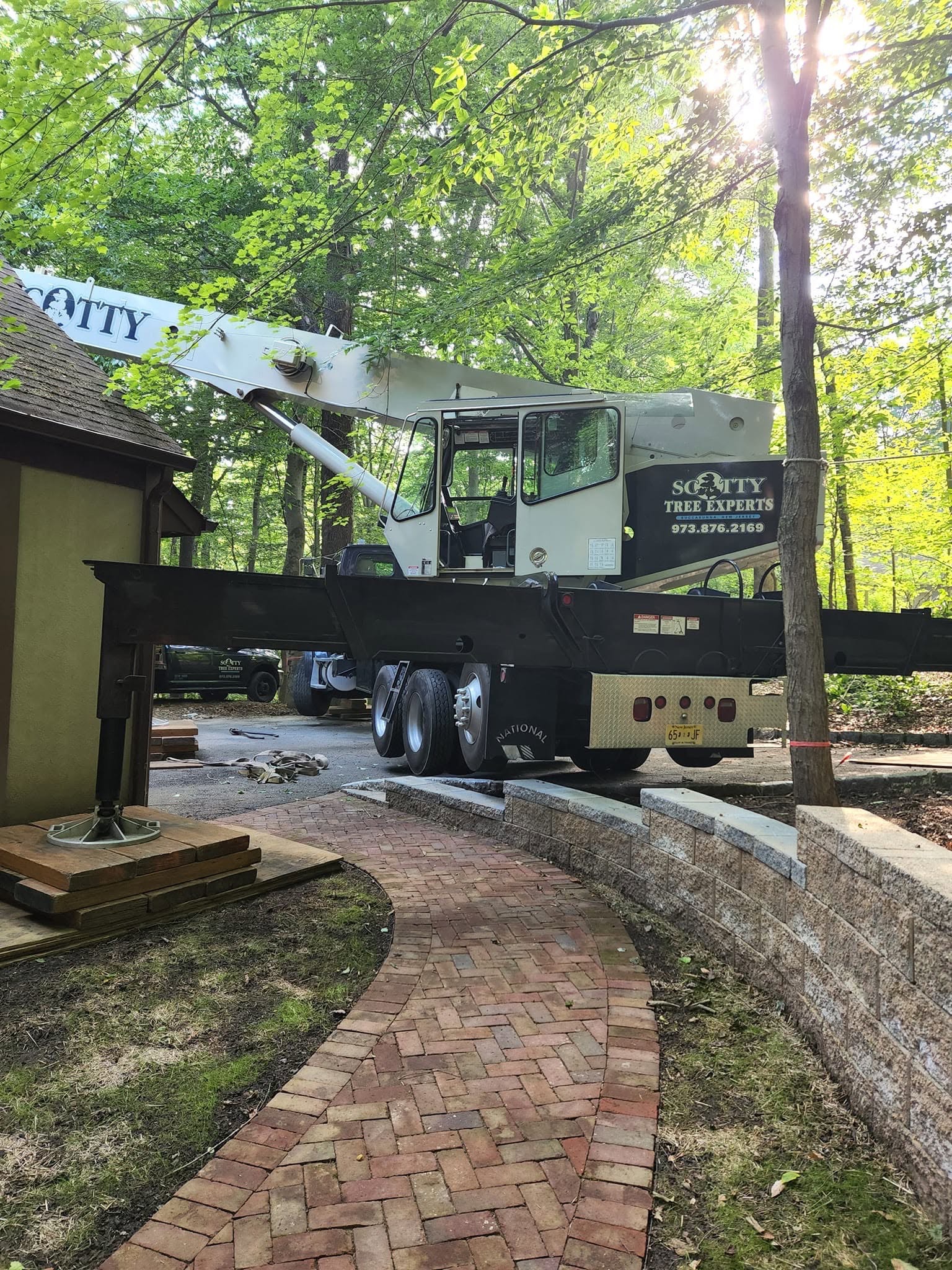 Crane positioned at a residential property